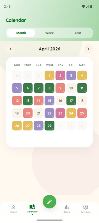 Calendar screen with colored mood cells